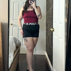 Nike black XL high-waisted athletic shorts with logo stripe